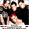 Group of five people in black shirts with red hair, posing closely together under text reading "GOOD CHARLOTTE" on a white background.
