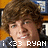Pixelated image of a person with brown curly hair wearing a dark jacket, with white text reading '1433 RYAN' at the bottom.