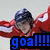 A person in a red and white jacket with arms outstretched, overlaid with pixelated text reading 'goal!!!', 'alex the great', and 'go caps' across different frames.