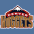 Pixelated icon with brown rectangular base, red curved top section, and white triangular peak against blue background.