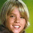 A pixelated image of a person with light brown hair smiling, next to a green background with black text reading "I love u".