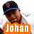 A person wearing a black cap with blue trim and purple emblem, white shirt, orange text overlays reading 'Johan' and 'Santana', and an orange '<3' symbol in the bottom-right corner.