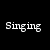 A black background displays white text reading 'Singing' and 'a song about', with a blue glowing effect on the word 'Coraline' below.