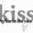 Pixelated grayscale text 'KISS' with a small dot above the first letter and a downward-pointing arrow below the last letter on white background.