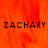 A static image with orange flame-like background and three instances of the text 'ZACHARY' in black pixelated font.
