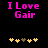 Two side-by-side display pink text reading "I Love Gair" above yellow and brown star-like symbols on a black background