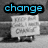 A four- displays text and symbols: 'change' above a protest sign, 'the' over a no-smoking symbol, and 'world' below a crowd scene
