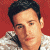 A pixelated image split into two sections: a person with dark hair and light skin on the left, and green text reading "Original Icons .com" on a dark green background on the right.