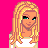 Pixel art of a blonde woman with green eyes, wearing white top and brown pants against bright pink background with yellow text.