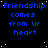 Blue text on black background with white dots, repeating 'Friendship comes from ur heart' in a pattern