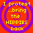 Four identical circular icons with concentric purple rings on a red background, each displaying yellow text reading "I protest ...bring the HIPPIES back".