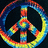 Colorful peace symbol with rainbow gradient border on dark background, static image.