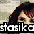 Pixelated image of three women with text "stasikastasika" overlaid, showing partial faces and hair in a