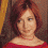 A pixelated image of a person with long brown hair, wearing a red off-shoulder top and pink necklace, displayed in four quadrants with one quadrant showing a red spiral pattern and white text.