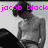 Pixelated grayscale image of a shirtless person with dark hair, overlaid by bright pink text reading 'jacob block' in lowercase letters.