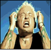 A person with light hair and tattoos holds both hands to their head against a blue background, displaying multiple facial expressions in sequence.