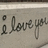 Static image with handwritten text on a light background and red pixelated text on a black background.