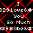 Pixelated text repeats 'I Love You So Much Baby' with red diamond patterns on black background, animated with alternating text visibility.