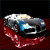 A silver car with blue headlights rests on a red fabric surface against a black background, shown in three with slight positional shifts