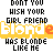 Pixelated text repeats across a with yellow and orange accents, showing partial phrases like 'DONT YOU WISH YOUR GIRL FRIEND HAS BLONDE LIKE ME' over white background