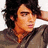 Pixelated image of a person with dark hair and brown eyes, wearing a gray shirt against a blue background with text.