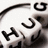 Pixelated black-and-white icon shows a stylized face with curved lines forming eyes and mouth, set against a light background.