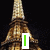 Animated Eiffel Tower icon with text changes: green vertical bar, blue 'Love', and pink 'Paris' appear sequentially against black background.