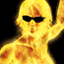 A figure with glowing yellow-orange hair and body, wearing black sunglasses, raised arm in a wave gesture against dark background.