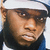 Two side-by-side pixelated portraits of a person wearing different hats and clothing, one with white cap and blue collar, the other with dark cap and light collar.