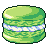 Pixelated green macaroon with light blue and white filling, dark green outline, and light green top surface on gray background.