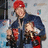 Pixelated image of a person in red cap and blue jacket holding two objects, with text overlays on black backgrounds.