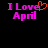 Pixelated text 'I Love April' in bright pink on black background with orange heart symbol replacing 'o' in 'Love' on left side.