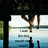 Pixelated image of a figure in mid-air above water, with trees and sky visible.