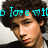 Pixelated image of a person with dark curly hair and light skin, wearing a black top against a white background.
