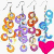 Four distinct pixelated icons with metallic hooks, featuring interlocking rings in orange-yellow, purple, red-brown, and blue-cyan hues, plus a solid pink heart shape.