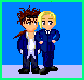Two cartoon figures in dark blue suits stand side-by-side against a blue background, with one figure's head turning from left to right across frames.