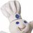 A pixelated cartoon dough figure with a chef's hat, blue eyes and nose, smiling face, and one arm raised against white background.