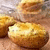 Pixelated image of baked potatoes with text overlay in multiple color variations.