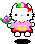 Pixelated white cat with black eyes and orange nose holds purple flower, wears pink dress with yellow symbol, red trim, green sleeves; rainbow bow on head.