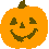 Four orange pumpkin icons with dark green stems and carved faces arranged in a on a light gray background