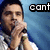 A person holding a microphone against a blue background, with text and symbols changing across frames.