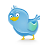 Pixelated blue bird with yellow beak and feet, standing on gray background, head tilted left, eyes looking forward.
