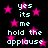 Black background with pink stars and repeated light blue text reading "yes its me hold the applause" in a pixelated font.