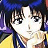 Pixelated anime-style character with blue hair and yellow clothing, next to black background with white text reading 'Anime IM' and 'c0m'