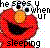 Pixelated red flower with orange center and black eye-like shape, surrounded by scattered colored pixels on white background.