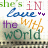 Pixelated text reads "she's in Love with the world" across multiple lines, featuring varied colors and a small purple double quotation mark.