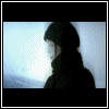 Animated sequence showing a figure in dark clothing and beanie turning from profile to face, then transforming into animal-like forms with glowing eyes against light background.