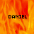 A fiery orange and red background with three instances of the text 'DANIEL' in black pixelated font across different positions.