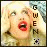 Animated contact sheet of a woman with blonde hair and red lipstick in various poses, each frame showing vertical text "GWEN" on the right side.