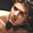 Static 48x48 pixel icon showing a close-up of a person's face with visible skin tones, dark hair, and partial shoulder in low-resolution detail.